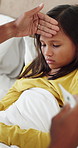 Daughter, fever and thermometer of father in bedroom of home for checkup, health monitoring or illness. Forehead, sick and temperature with girl in bed for healing, parent care or wellness concern