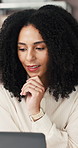 Woman, reading and laptop in office with ecommerce report, courier update or planning for shipping. Person, thinking and computer in depot with delivery feedback, online logistics and administration.
