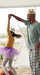 Dance, smile and ballet with father and girl in home for learning, support and fun bonding. Princess, fantasy and daughter with tutu and dad in house living room for playful, love and childhood laugh