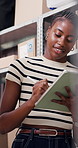 Tablet, pen and black woman in office with logistics for delivery, boxes and ecommerce order. Digital technology, cargo and African female supply chain manager with online shipping information.