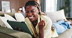 Black woman, tablet and celebration on sofa in home with fist pump, happy or winner with online game. African person, relax and smile with tech, app and success for giveaway prize in web at apartment