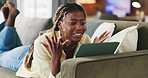 Tablet, smile and black woman on sofa with wow, internet movie or social media in home. Surprise, communication and student on couch with digital tech, app subscription or streaming in living room