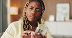 Confused, doubt and black woman with phone in home for texting, networking or communication on app. Social media, bad news and female person with tech for fake website, scam or chat in living room