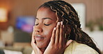Headache, fatigue and black woman in living room with massage, frustrated or tension with discomfort. Pain, tiredness and person in house with migraine, inflammation or sore head with dizziness.
