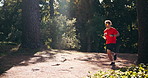 Running, athlete and man in nature for cardio, fitness and training routine for wellness or exercise. Outdoor, runner and person with endurance for workout, healthy and physical activity at park