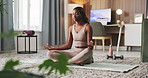 Yoga, breathe and black woman in lotus pose for meditation, mindfulness and balance on floor. Home, morning and person with calm for holistic healing, wellness and breathing exercise in living room