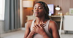 Yoga, breathing and black woman in home, fitness for health benefits and wellness. Apartment, yogi and African person in lounge, heart lungs and exercise for peace, routine and movement on floor