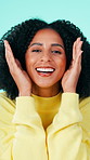 Peekaboo, happy and face of woman in studio for surprise, fun or playing game with laughing. Smile, excited and portrait of person covering eyes for hide and seek, reaction or shy by blue background.