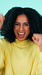 Woman, face and excited with cheering for win, lottery success and prize on studio background. Person, portrait and energy with fist pump for announcement, competition victory and bonus achievement