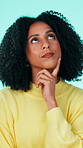 Thinking, ideas and woman in studio, decision and contemplation on blue background. Solution, emoji and person with reflection, memory and remember with wonder, thoughtful and positive mindset