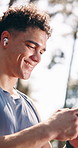 Fitness, phone and earphones with man in nature for runner stats, health app and streaming. Music, workout and wellness with person outdoor for communication, training plan or monitor progress
