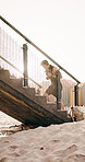 Exercise, staircase and man with steps, wellness and routine for training, sunshine and challenge. Outdoor, person and athlete with energy, space and cardio workout with endurance and fitness