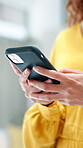Message, phone or hands in agency with communication, agenda change or online conversation for project. Text, employee networking or woman with tech, schedule update or connection in report feedback.