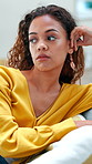 Upset, breathing and woman on sofa in home with thinking, anxiety or panic attack for loneliness. Mental health, doubt and female person in living room with reflection, mistake or regret in house.