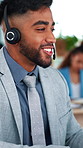 Call center, talk and man in office for help, financial support and account advice with feedback. Headset, hotline and happy consultant with tech, coworking or transaction troubleshooting for banking