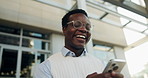 Businessman, online and laughing with phone in city, travel or chatting with contact on social media. Outdoor, employee and black person with smile for funny message, reading and commute with mobile