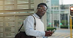 Serious, businessman and travel with phone at bus stop, online or communication with contact in city. Outdoor, employee and black person with mobile for chat, commuting and waiting for transport
