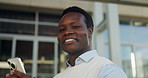 Phone, waiting and face of black man in city for travel, cab or taxi on mobile app for commuting to work. Portrait, wink and African employee with cellphone for car service at location in urban town.