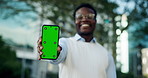 Face, black man and phone with green screen outdoor for travel, social media and online marketing. Portrait, male person or mockup space with mobile app, advertising promotion and commute destination