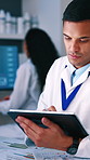 Scientist, man and data analysis in lab with tablet, medical research and results for vaccine trial. Coworking, person and science in clinic with tech, healthcare graphs or stats for cure development