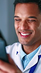 Phone, laughing and man in laboratory for development of cure, pharmaceuticals or vaccine. Communication, medical research and smile with scientist at work in healthcare facility for clinical trial