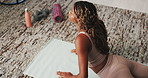 Yoga, stretching and black woman in lounge, fitness for health benefits and cobra. Balance, yogi and African person in home, warm up and exercise for peace, morning routine and movement on floor