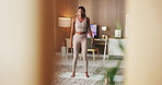 Black woman, stretching or yoga with mat in home for physical activity or workout preparation. Female person, yogi or getting ready with body shake or warm up for exercise or indoor training in house