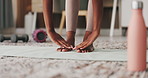 Woman, hands and stretching with toes on mat in home for workout, exercise or indoor training. Female person, yogi or reaching feet with warm up or activity for fitness, health or wellness in house