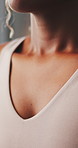 Woman, chest and breathing for meditation at house with chakra, inner peace and mindfulness. Closeup, female person and inhale exercise for yoga, spiritual healing and self care with holistic balance