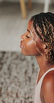 Fitness, stretching and black woman with yoga mat in home, holistic health and posture activity for practice. Active, pilates routine and calm person with cobra pose for exercise, wellness and peace