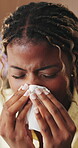 Woman, flu and blowing nose in apartment with tissue, health problem or cold symptoms from burnout. Sick, black person and allergy in home with toilet paper, virus or congestion from sinus infection.