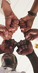 Team, fist bump and hands of business people in office for meeting, solidarity and trader synergy. Community, low angle and broker mission with group of employees in agency for support and, success