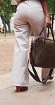 Outdoor, walking or legs of person with bag, professional consultant or morning commute for legal career. Shoes, lawyer or business woman with briefcase for lawsuit filing, travel or journey to work