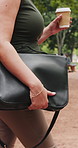 Outdoor, bag and hands with coffee for walking, professional consultant and commute for legal career. Beverage, lawyer and business woman with briefcase for lawsuit filing, travel and journey to work
