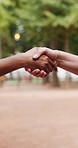 Closeup, handshake and business people in city, partnership for b2b deal and agreement for project. Introduction, thank you and consultant in street, shaking hands and collaboration with greeting
