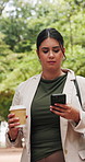 Business, coffee and woman in park, phone for social media and message to contact. Outdoor, mobile user and person with herbal tea, tech for texting and morning commute with connection and internet
