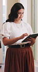 Business, scroll and woman in office, tablet for guest list review and venue selection. Event planner, entrepreneur and person in workplace, tech for vendor management or digital app for schedule