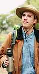 Hiking, thinking and man in forest, vacation for weekend break and hobby for fitness. Water bottle, hiker and person in woods, reflection and contemplation for journey, discovery and sightseeing
