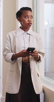 Thinking, business and black woman with phone in office for research, email response and online schedule. Startup, manager and person on cellphone for reminder, communication and digital planner
