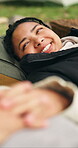 Picnic, relax and smile of woman outdoor with partner for bonding, dating or romance in autumn. Break, love and moment with happy couple on field in nature together for relationship security or trust