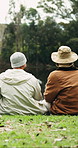 Outdoor, camping and friends with discussion for break, eco tourism and sightseeing for winter holiday. Relax, bonding vacation and people by lake for nature view, back and support for weekend travel