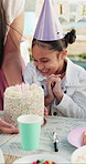 Surprise, excited and child with cake at birthday party for celebration, special day and dessert outdoor. Family, happy and girl with decorations, hat and candles for event, gathering and milestone
