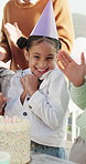Family, applause and child with cake at birthday party for celebration, special day and dessert outdoor. Happy, parents and girl with surprise, hat and candles for event, gathering and clapping hands