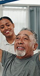 Physiotherapist, stretching or old man in clinic with resistance band, mobility or support in rehabilitation. Wellness, patient or chiropractor with aid, arm exercise or muscle recovery in retirement