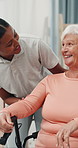 Happy woman, physiotherapist or senior patient with wheelchair for assisted living or mobility. Female people, caregiver and helping elderly person with a disability for healthcare, support or aid
