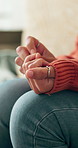 Overthinking, hands and woman on sofa in home with nervous, mental health or stress in living room. Frustration, anxiety and female person with worry for decision, choice or trauma in apartment.