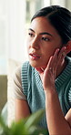 Stress, thinking and girl with concern in home for student debt pressure, college grade and pensive. Serious, woman and reflection on sofa for contemplating results, future introspection and ponder