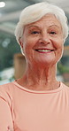 Face, senior woman and smile at physiotherapy for checkup, medical assessment and recovery. Portrait, elderly person and happy for physical therapy, healthcare healing and rehabilitation consultation