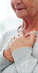 Chest pain, hands and senior woman in clinic for checkup with lung infection, asthma or heartburn. Medical consultation, discomfort and elderly female patient with respiratory virus in office.