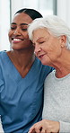Happy, hug and caregiver with senior woman in nursing home for support, care and connection. Retirement, healthcare and nurse with elderly person for embrace, empathy and trust for medical service